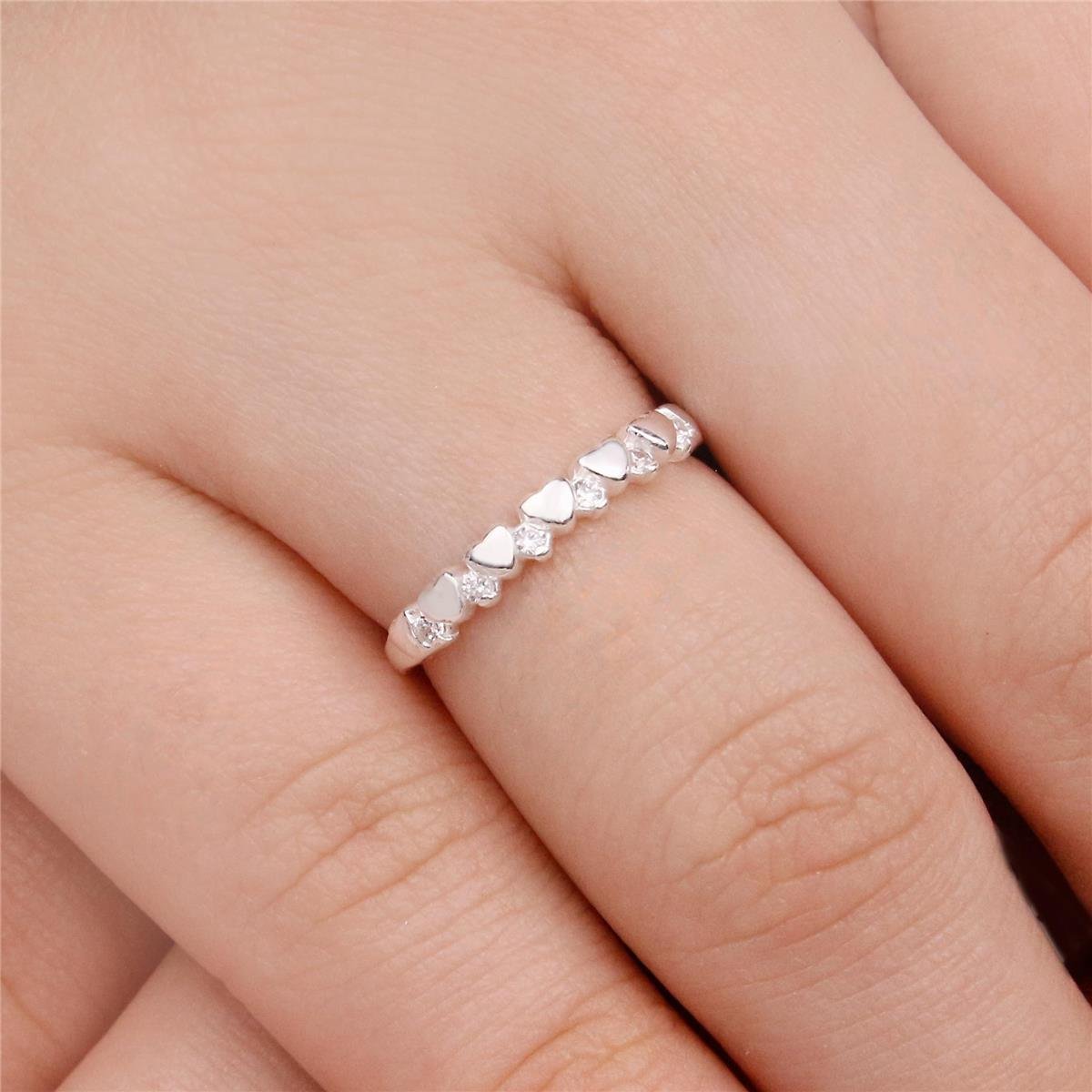 ANEL PRATA COM CORAÇÕES LISOS E ZIRCÔNIAS