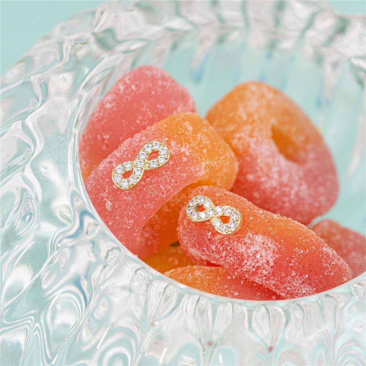 BRINCO FOLHEADO A OURO INFANTIL INFINITO CRAVEJADO COM ZIRCÔNIA CRISTAL