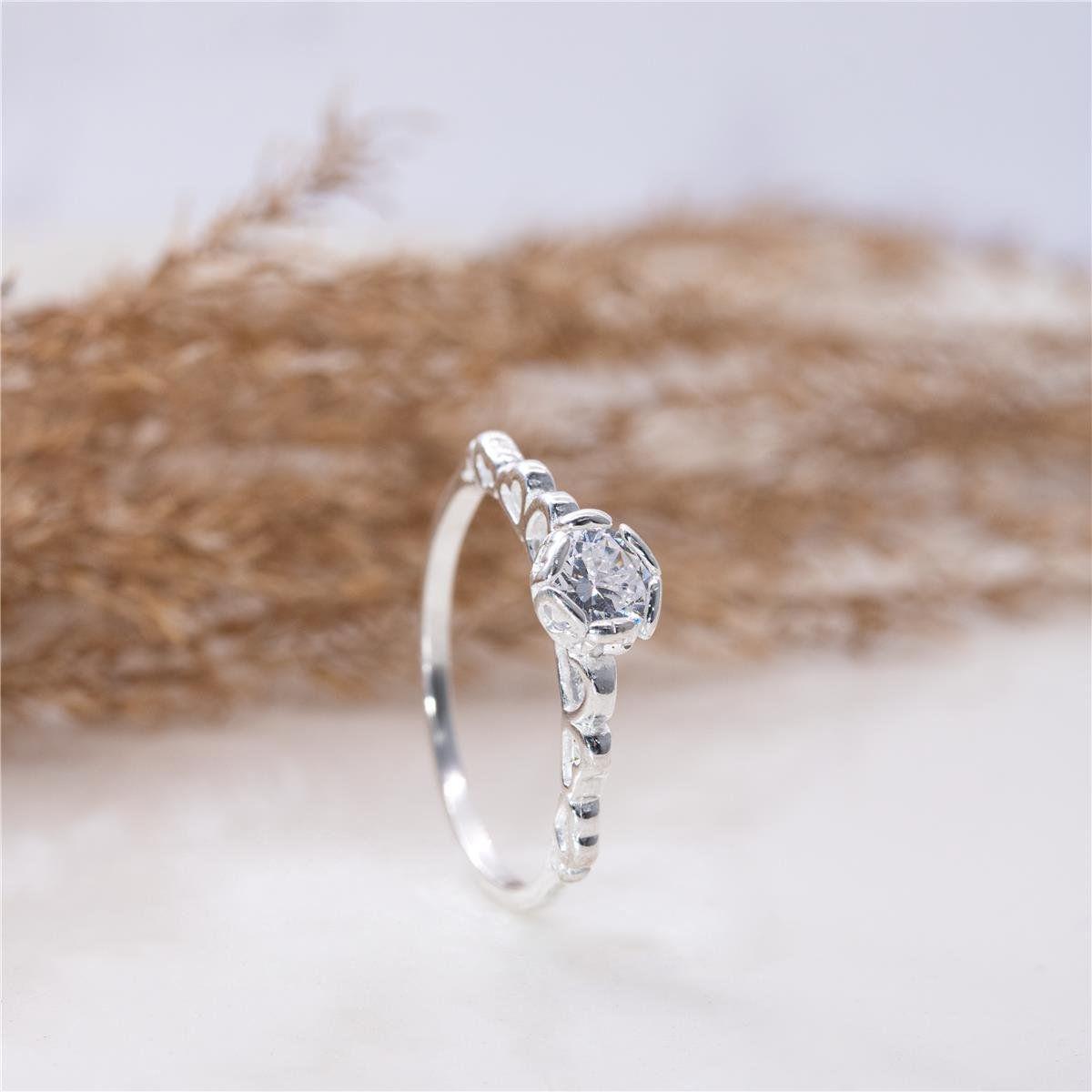 ANEL PRATA COM CORAÇÕES VAZADOS E SOLITÁRIO 