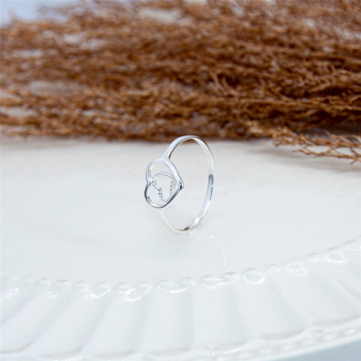 ANEL PRATA COM CORAÇÕES LISOS E VAZADOS