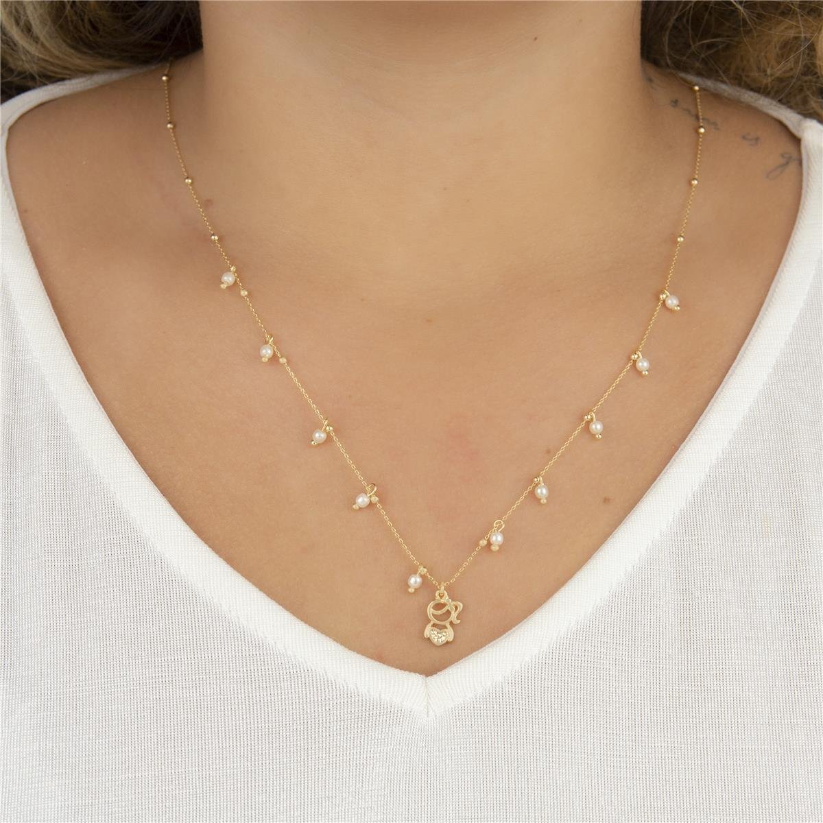 COLAR FOLHEADO A OURO COM PÉROLAS E MENINA