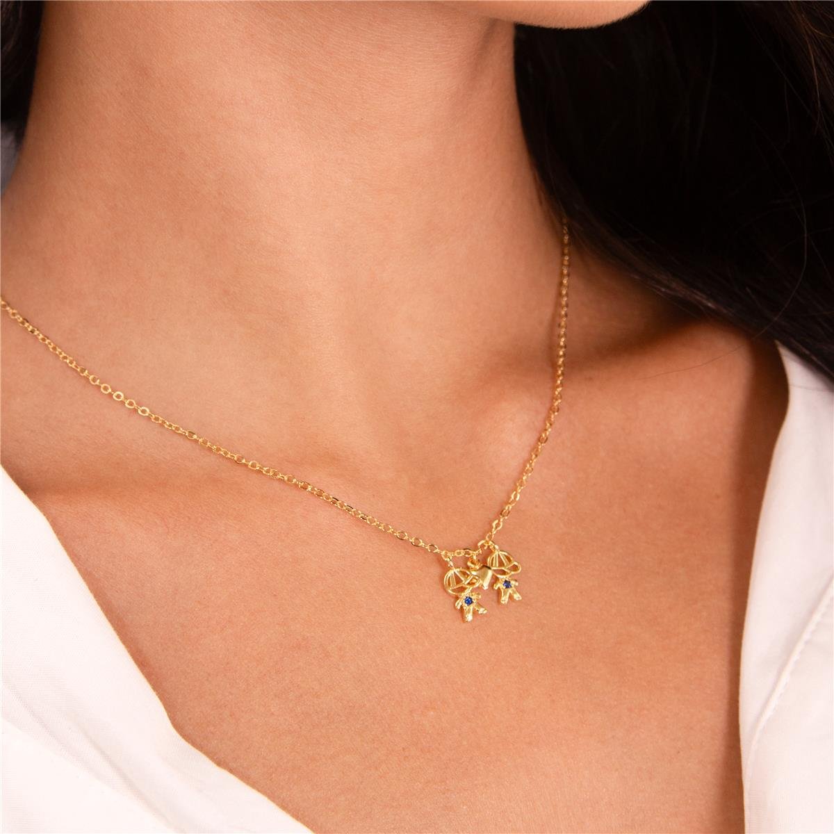 COLAR FOLHEADO A OURO COM MENINOS E MINI CORAÇÃO LISO