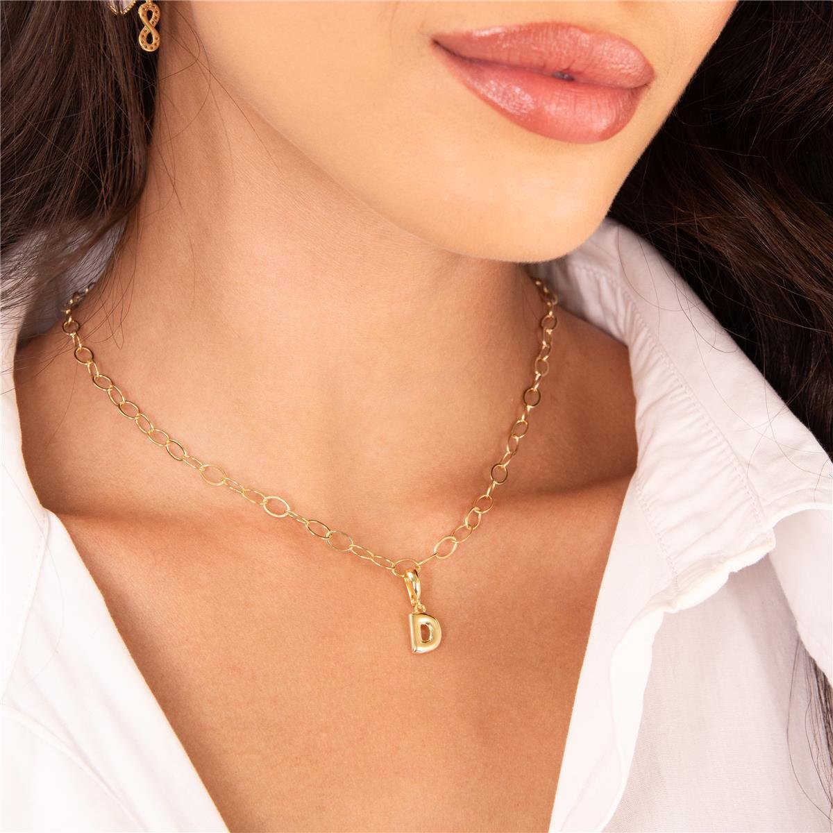 PINGENTE FOLHEADO A OURO LETRA LISA COM FECHO DE CLIQUE 