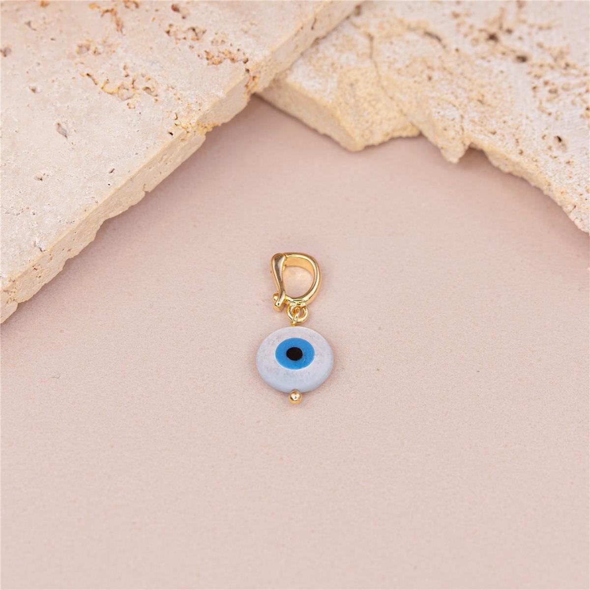 PINGENTE FOLHEADO A OURO DE CLIQUE COM OLHO GREGO