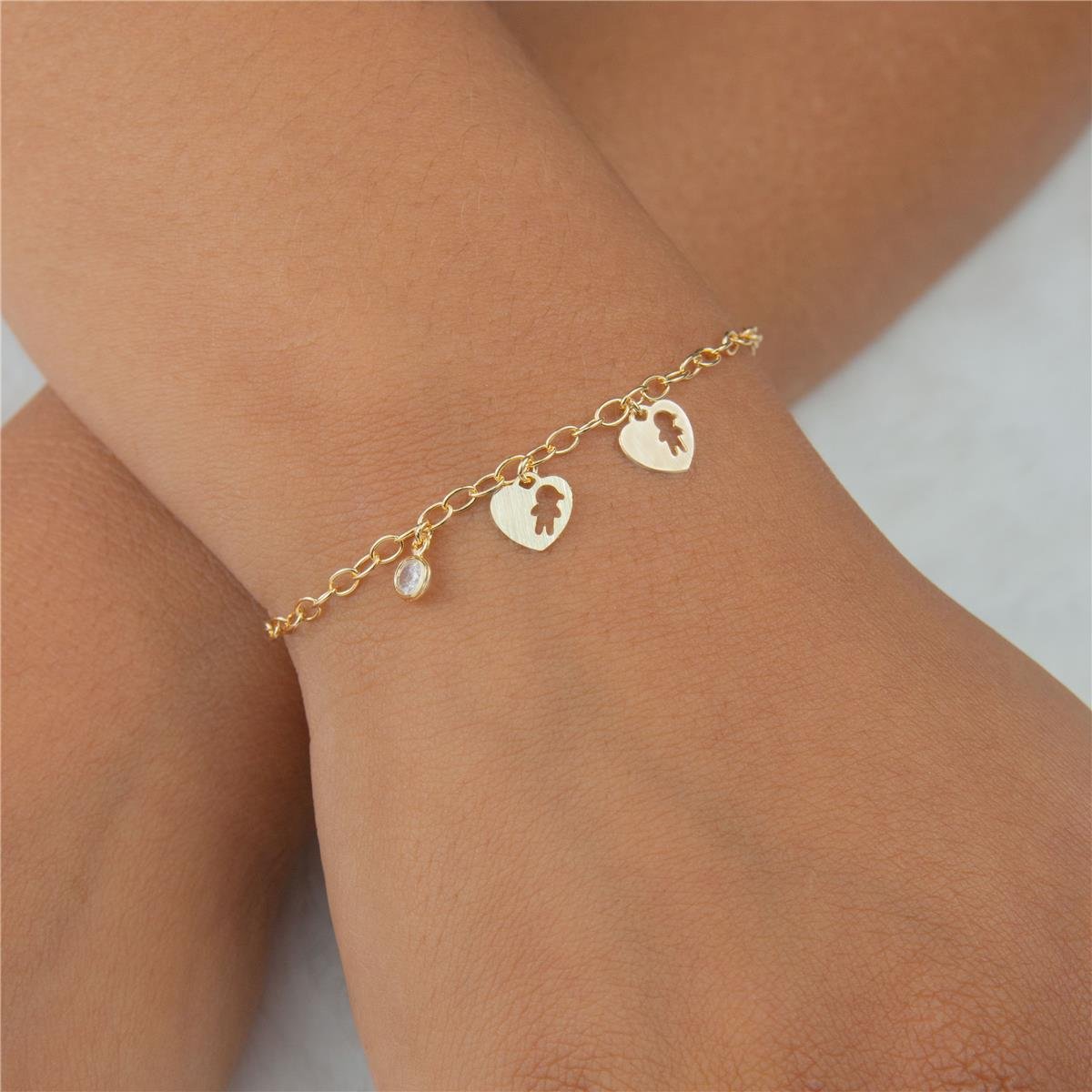 PULSEIRA FOLHEADO A OURO COM ZIRCÔNIA E CORAÇÃO COM MENINOS