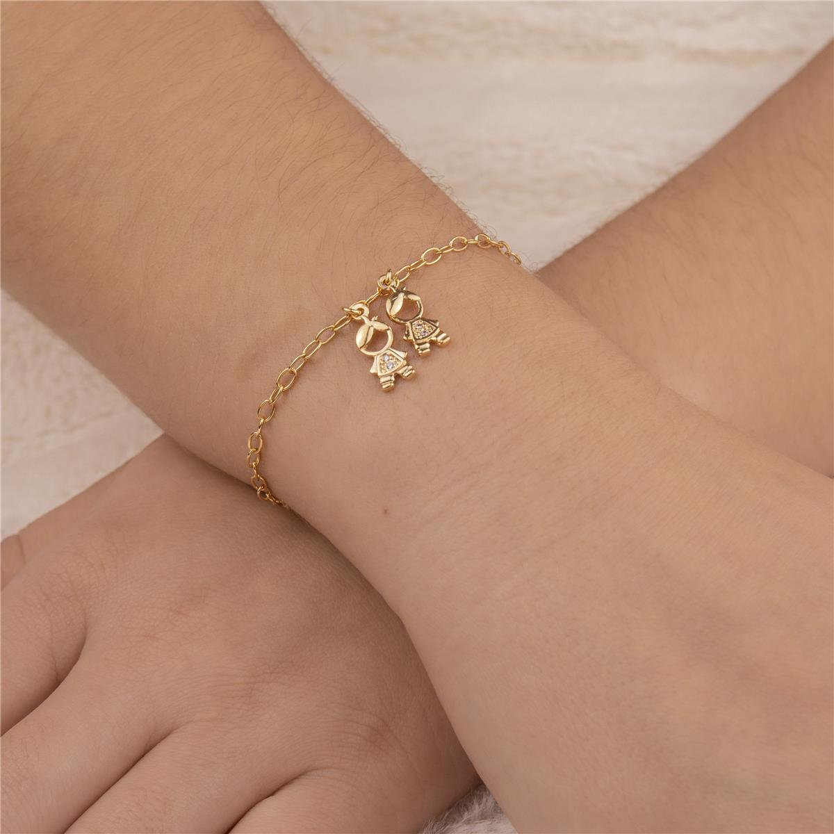 PULSEIRA FOLHEADO A OURO MENINOS COM ZIRCÔNIAS