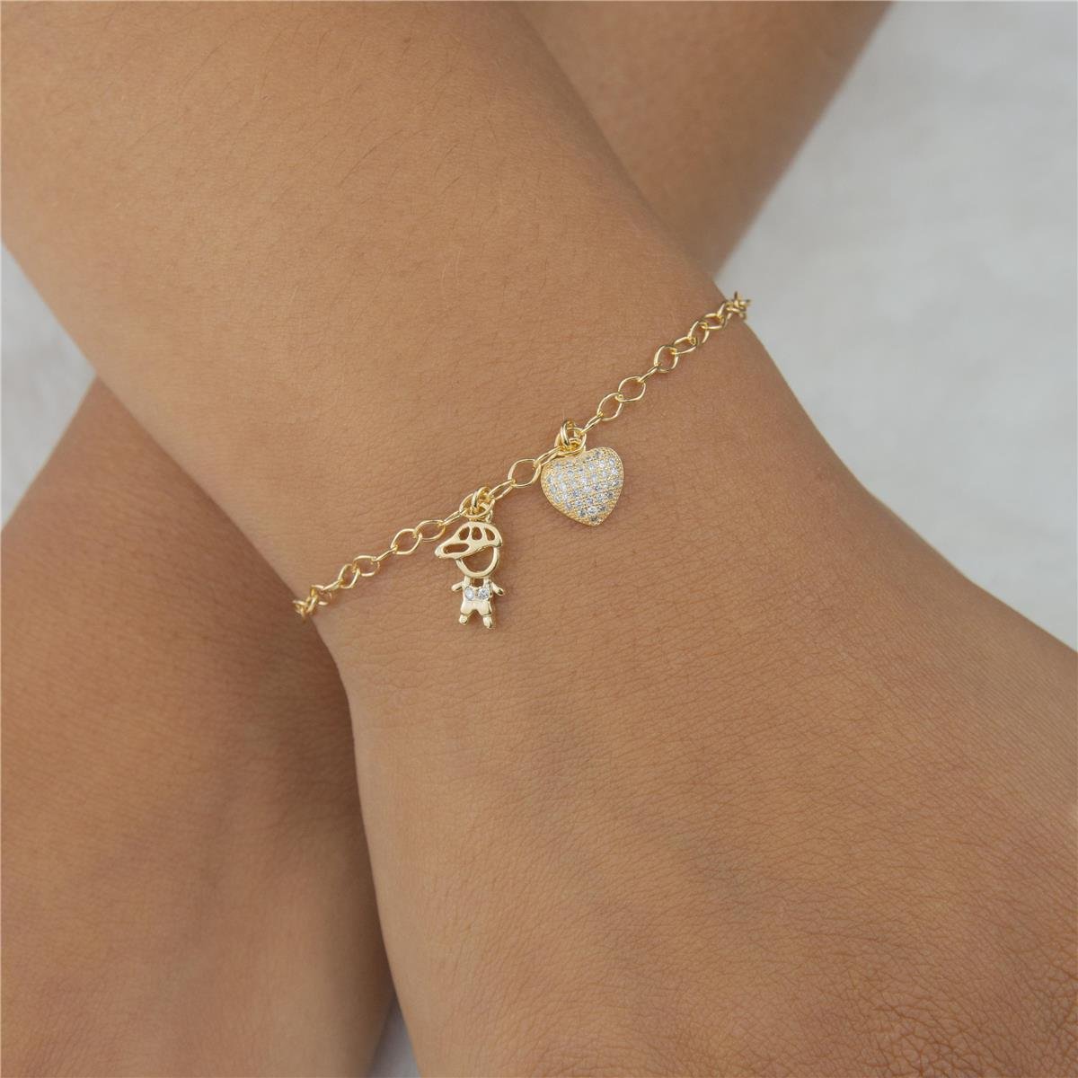 PULSEIRA FOLHEADO A OURO CORAÇÃO COM MENINO