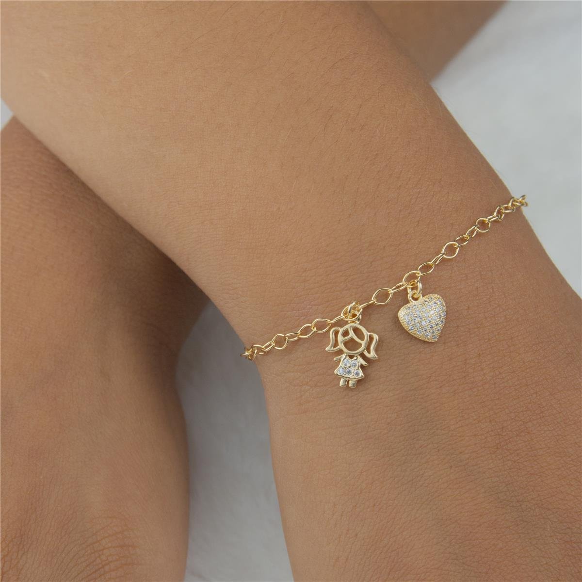 PULSEIRA FOLHEADO A OURO MENINA E COM CORAÇÃO DE ZIRCÔNIAS
