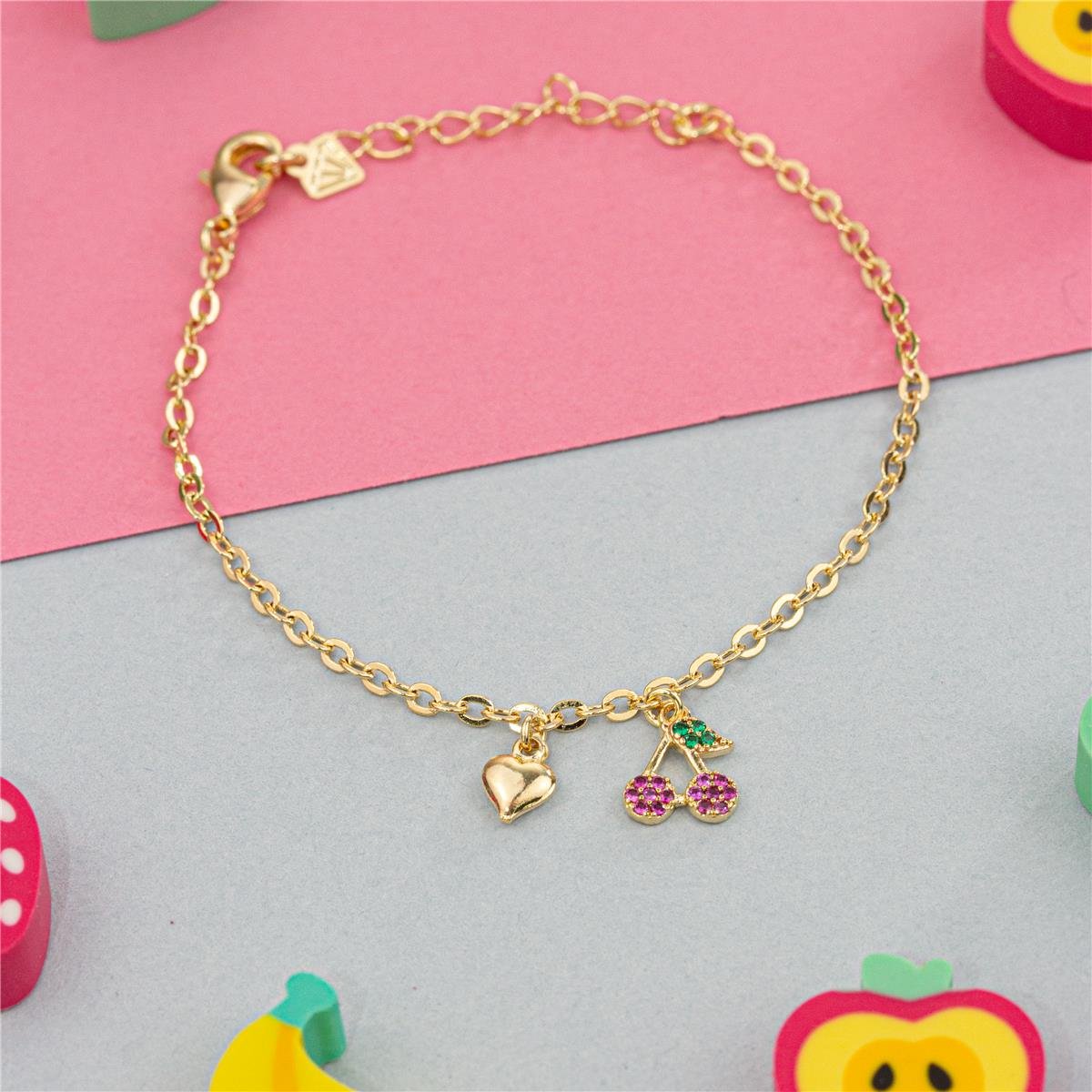 PULSEIRA FOLHEADO A OURO INFANTIL COM CEREJA E MINI CORAÇÃO