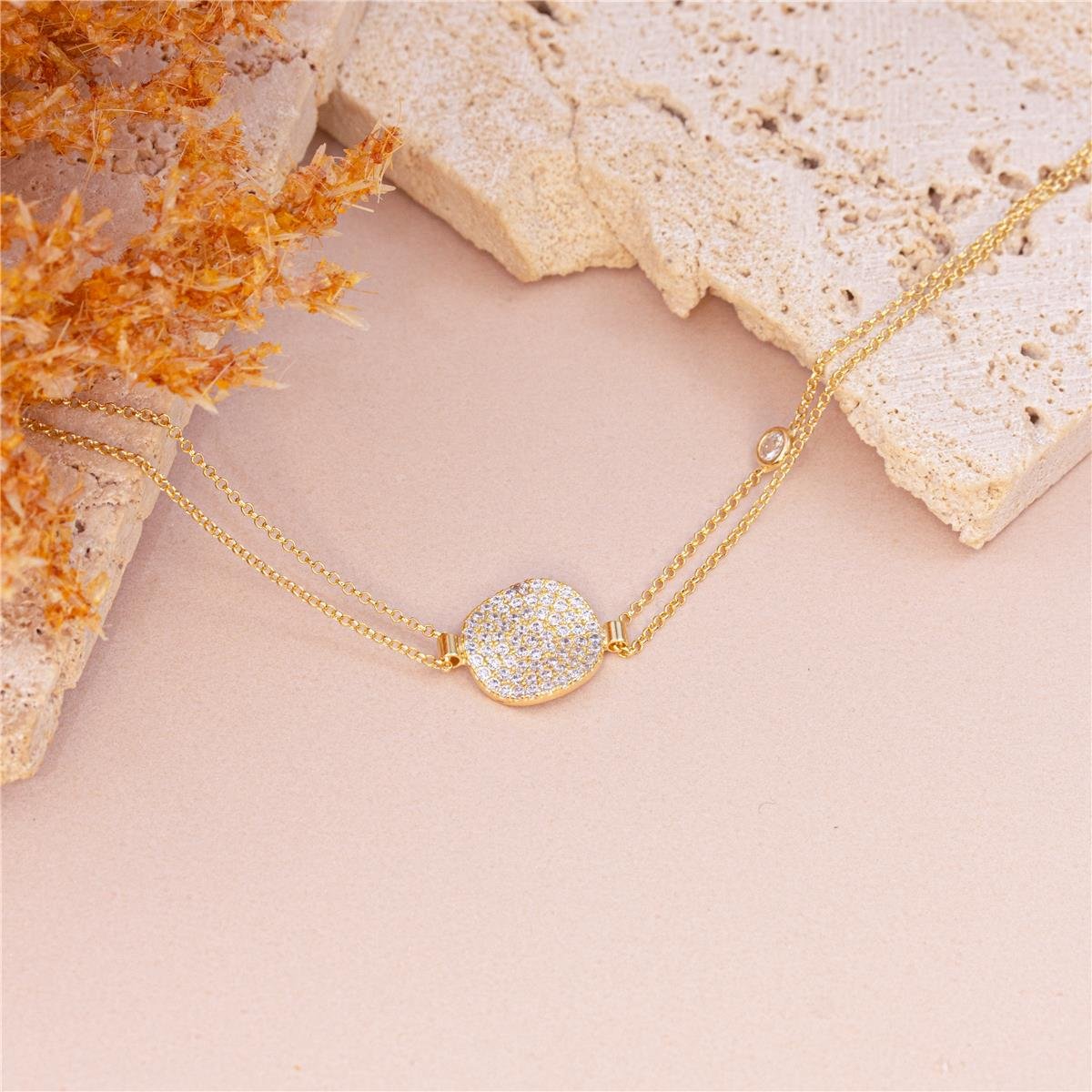 PULSEIRA FOLHEADO A OURO DOIS FIOS TRABALHADA COM ZIRCÔNIAS