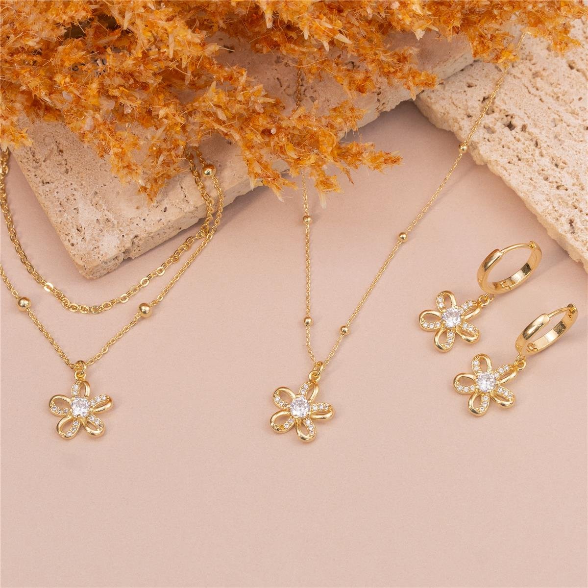 PULSEIRA FOLHEADO A OURO DOIS FIOS COM FLOR LISA E ZIRCÔNIAS