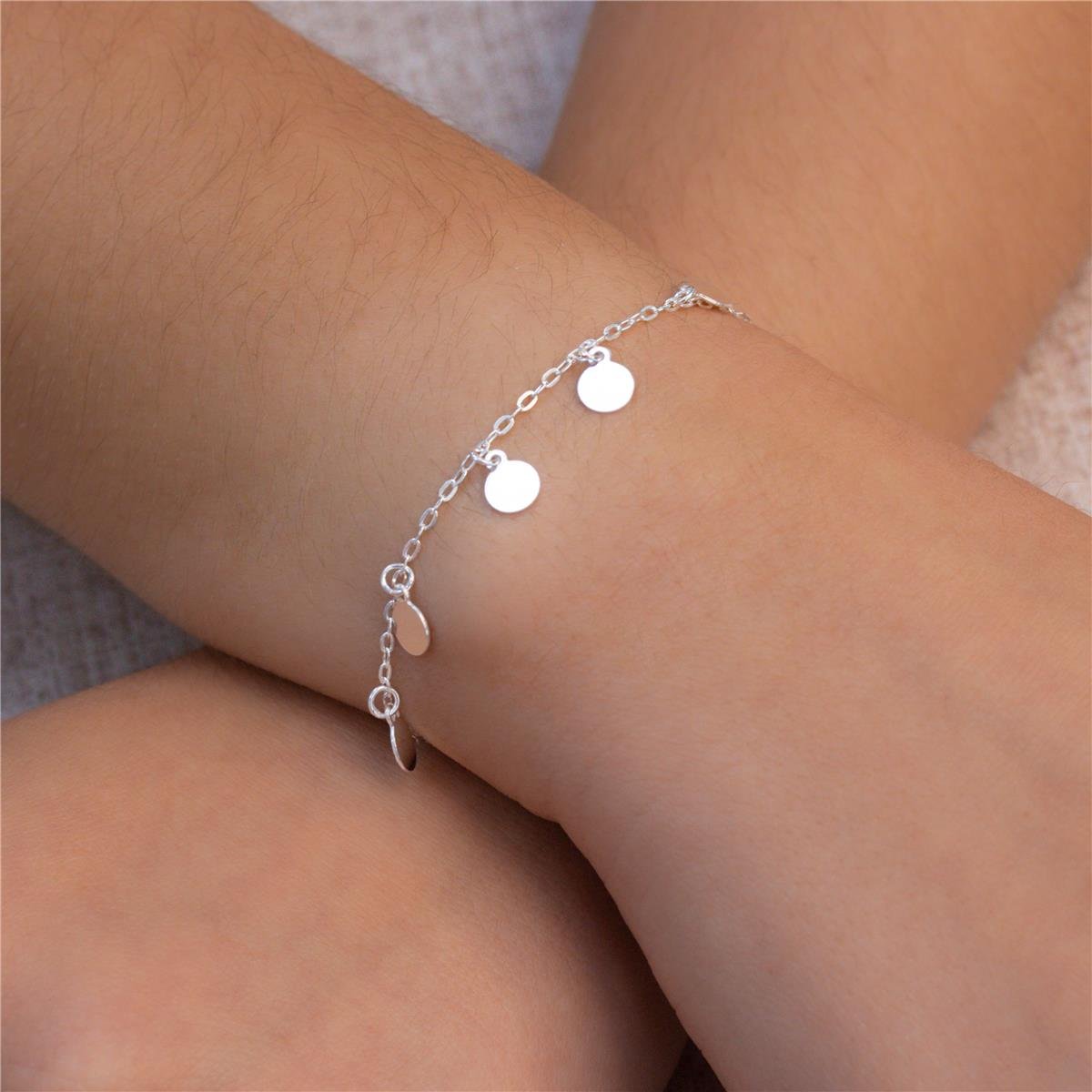 PULSEIRA PRATA ELOS COM DISCOS LISOS