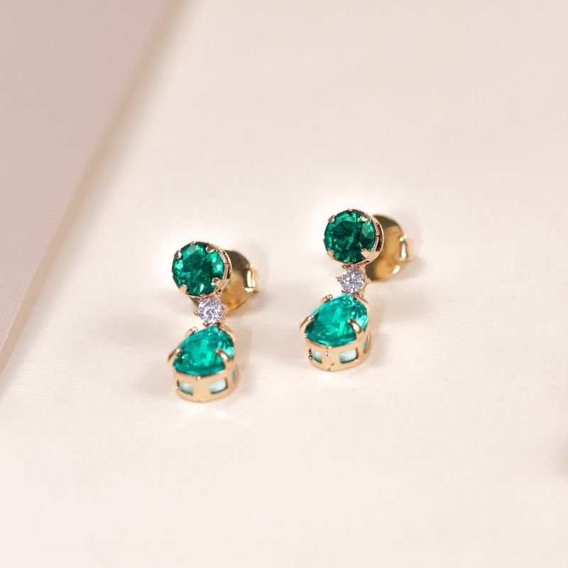 BRINCO FOLHEADO 1 ZIRCÔNIA CRISTAL E ZIRCÔNIA REDONDA E GOTA